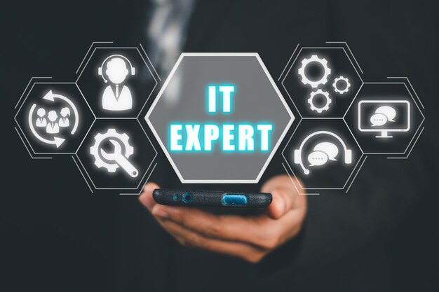 it-expert-concept-person-hand-touching-mobile-phone-with-it-expert-icon-virtual-screen-information-technology-advice-services_1296497-4927
